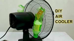 Video maker shows temperatures plummet as he turns on the air con. Diy Air Conditioner By Reusing Plastic Bottles