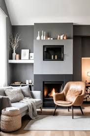 Black Brick Fireplace On Gray Wall