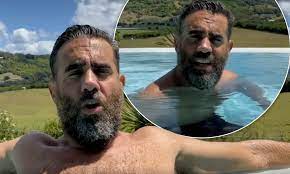 Bearded Bobby Cannavale goes shirtless as he relaxes in an infinity pool |  Daily Mail Online