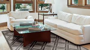 The rugs look perfect with the living room's style. How To Position A Living Room Rug Size Shape Matter