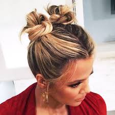 A single visible bobby pin seems to hold the updo from falling apart. Short Hair Bun Hairstyles For Girls Bpatello