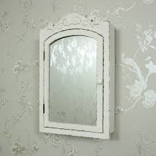 cream ornate mirrored wall cabinet