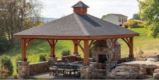 This enclosed patio consists of wooden slats and a steel roof structure. What Is A Pergola With A Roof Retractableawnings Com