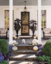 Easy and affordable front porch decor ideas you can do to create a welcoming curb appeal for your home using a plaid rug, rocking chairs and some paint. The Best Front Porch Decorating Ideas For Every Month Of The Year Martha Stewart