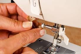 how to fix sewing machine needle stuck