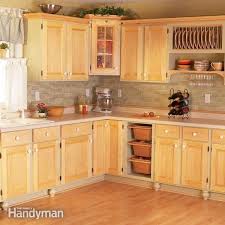 Detach cabinet doors from the cabinets by unscrewing the hinges. Cabinet Facelift Diy