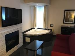 Fireplace Jacuzzi Tub With Large Couch