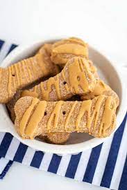 They can also work wonders in helping to manage your dog. Homemade Peanut Butter Dog Treats Cookie Dough And Oven Mitt