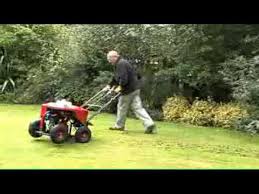 Lawn aeration—a process of making holes in the turf—breaks up hard soil so that water and nutrients penetrate the grass roots more easily. Petrol Lawn Aerator Youtube