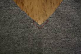 Flatten the little triangle with your iron so it lies flat. How To Sew A V Neck T Shirt Melly Sews