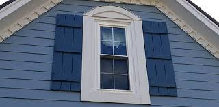 vinyl or fiberglass replacement windows