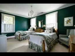 bedroom with dark green walls you