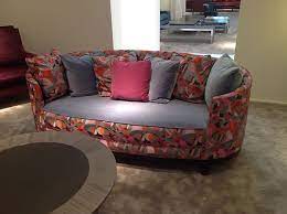 the oval shaped sofa with fabric
