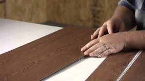 Vinyl floor comes in sheet flooring or floor tiles, and these are applied to the subfloor using tile mastic or vinyl adhesive, unlike some commercial places where the tiles are sometimes buffed or waxed. Glue Down Vs Peel Stick Vinyl Plank Flooring Help Youtube