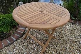 The groove design adds an decorative touch to the table and is not something you can buy in a store. Mortimer Round 1m Teak Folding Garden Table And Outdoor Living Field Hawken