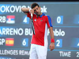 Frustrated Djokovic throws racquet in ...