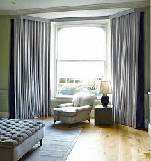 bay windows with curtains and blinds