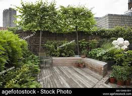 l shaped terrace garden stock photos