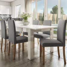 Buy your extending table and chairs on finance today! Extendable Dining Table In White High Gloss With 6 Grey Chairs Vivienne New Haven Furniture123