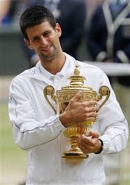 Novak djokovic has won the wimbledon tennis tournament four times and will be chasing his fifth trophy as he returns to the sw19 showpiece today against roger federer. Novak Djokovic 2011 Wimbledon Champion I Am Survivordean