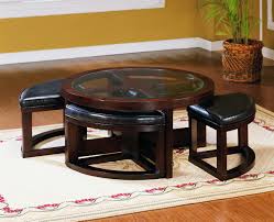 Finished in smooth black and white vertical stripes, this circular coffee table constitutes a truly stylish accent. Coffee Table With 4 Storage Ottomans Ideas On Foter