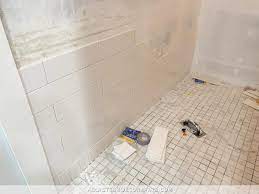 shower wall tile is finally underway