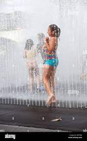 Fountain girl soaking wet hi