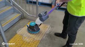 battery powered orbital floor scrubber