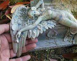 Gothic Weeping Angel Lying On Grave