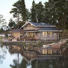 Дом на берегу озера в лесу