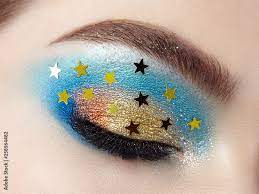 eye makeup woman with decorative stars