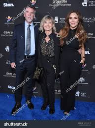 She has been active since 1963, when she was 15. Los Angeles Jan 25 John Easterling Olivia Newton John And Tottie Goldsmith Arrives For The G Day Usa Gala On Sponso In 2020 Photo Editing Stock Photos Los Angeles