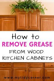 To keep the clean kitchen cabinets grease free, wipe down the stove and cupboards with a soft cloth every week. Nobody Likes Sticky Grease On Kitchen Cabinets Learn How To Remove Grease From Wood Kitchen Cleaning Wooden Cabinets Cleaning Wood Cabinets Cleaning Cupboard