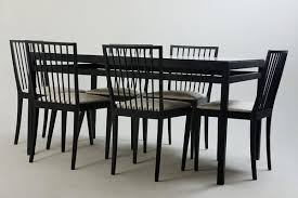 Available also as a side chair and with a swivel base, it blends in with pretty much any style and theme. Mid Century Modern Dining Table Chairs Set From Flama Manufacture Brazil 1950s Set Of 7 For Sale At Pamono