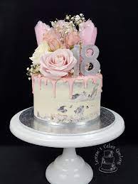 Thai elephant cake (cake toppers supplied by client). Pretty In Pink White And Silver For An 18th Birthday This Is Caramel Mud Cake With White Chocolate Birthday Cake With Flowers White Birthday Cakes 18th Cake
