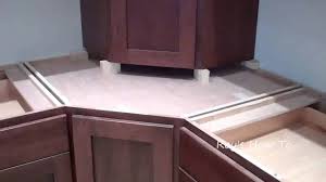 installing kitchen cabinets with