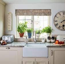 The taupe paint is a soft hue, so having all the cabinetry painted the same color does not darken or overwhelm the kitchen. Beautiful Home Pictures Of English Home In Derbyshire Beautiful Homes Of England House And Home Magazine Beautiful Houses Interior English Cottage Decor