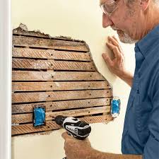 repair holes in lath and plaster walls
