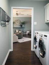 A laundry room gets a quick transformation with refreshing high contrast paint in the colors benjamin moore simply white and sherwin williams slate tile. Fixer Upper Yours Mine Ours And A Home On The River Home New Homes Fixer Upper