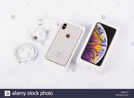 BURGAS, BULGARIA - NOVEMBER 8, 2018: Apple iPhone Xs Max Silver on white  background, back view. Charger, earpods and adapter accessories Stock Photo  - Alamy