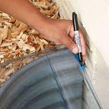 install a window well cover