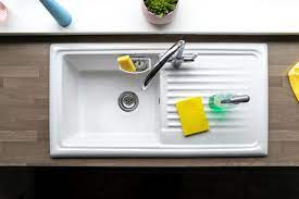 to clean your kitchen sink