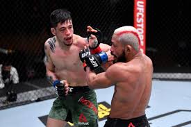 Moreno defeated brandon royval via tko (injury) at 4:59 of round 1 at ufc 255 on saturday in las vegas. Ufc 256 Deiveson Figueiredo Vs Brandon Moreno Results In Draw In Flyweight Main Event