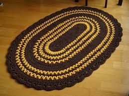 dark brown oval crochet rug