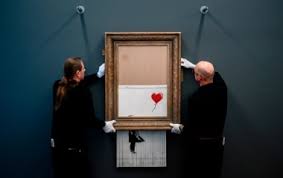 Another banksy painting, happy choppers, sold at a sotheby's auction in new york on the same day. Banksy S Self Shredding Painting Goes On Display Cnn Style