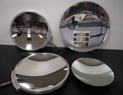 A concave object (mirror).