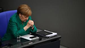 Merkel abandons open-door refugee policy to save government