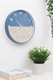Sleek Navy Blue Wall Clock With White