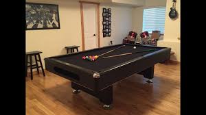 embly of a pool table with slates