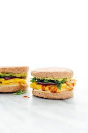This breakfast features sprouted bread and healthy ingredients like egg whites, avocado, tomatoes and hot sauce. Veggie Breakfast Sandwich Recipe Cookie And Kate